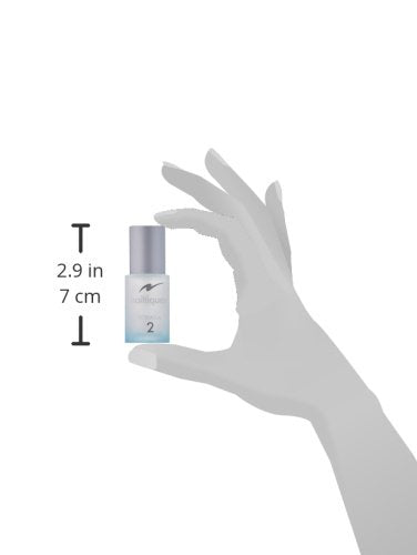 Bottle beside ruler to show Nailtiques 0.5 fl oz scale and travel-friendly benefit