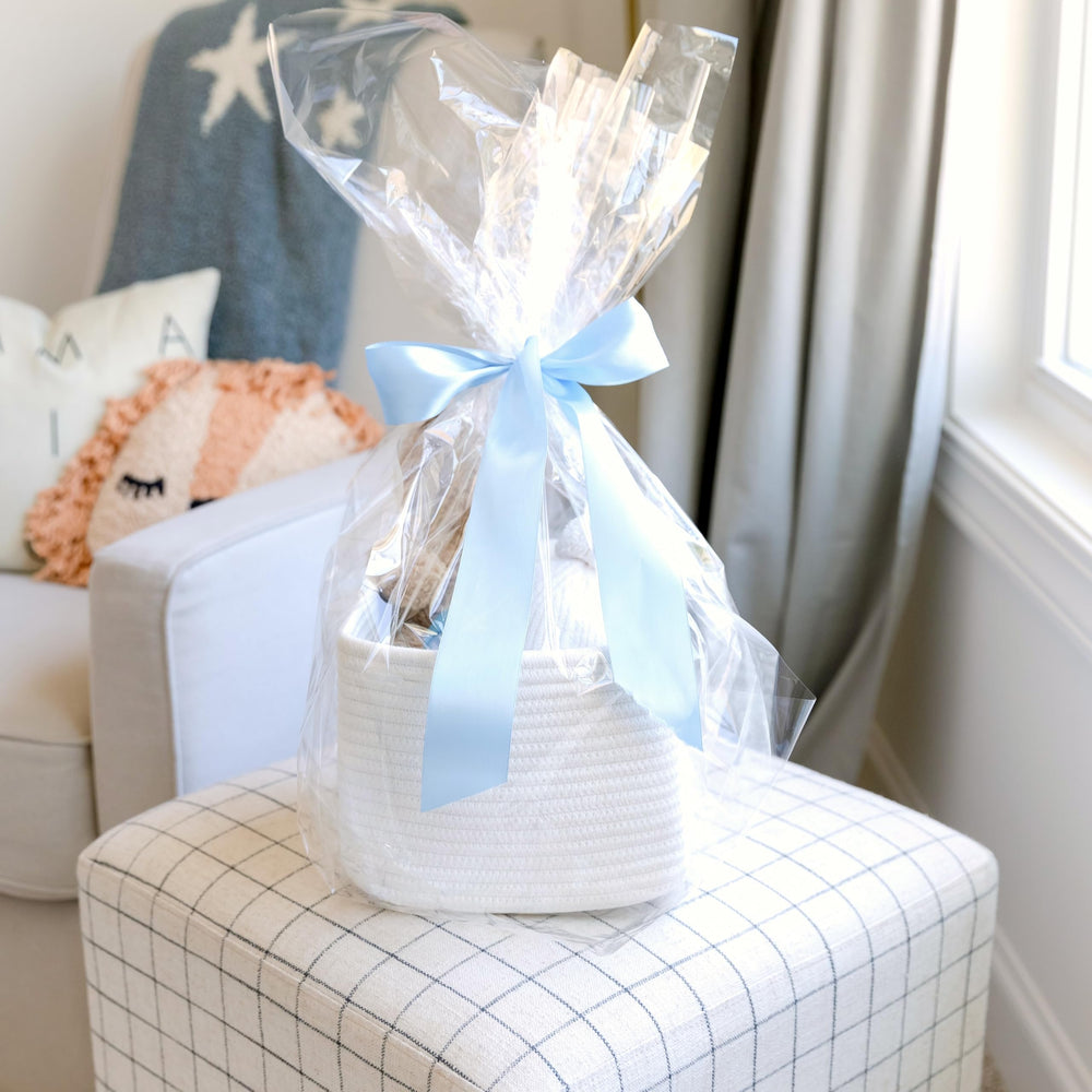 NaturalCozy bathroom use holding towels to show moisture-resistant look and tidy benefit
