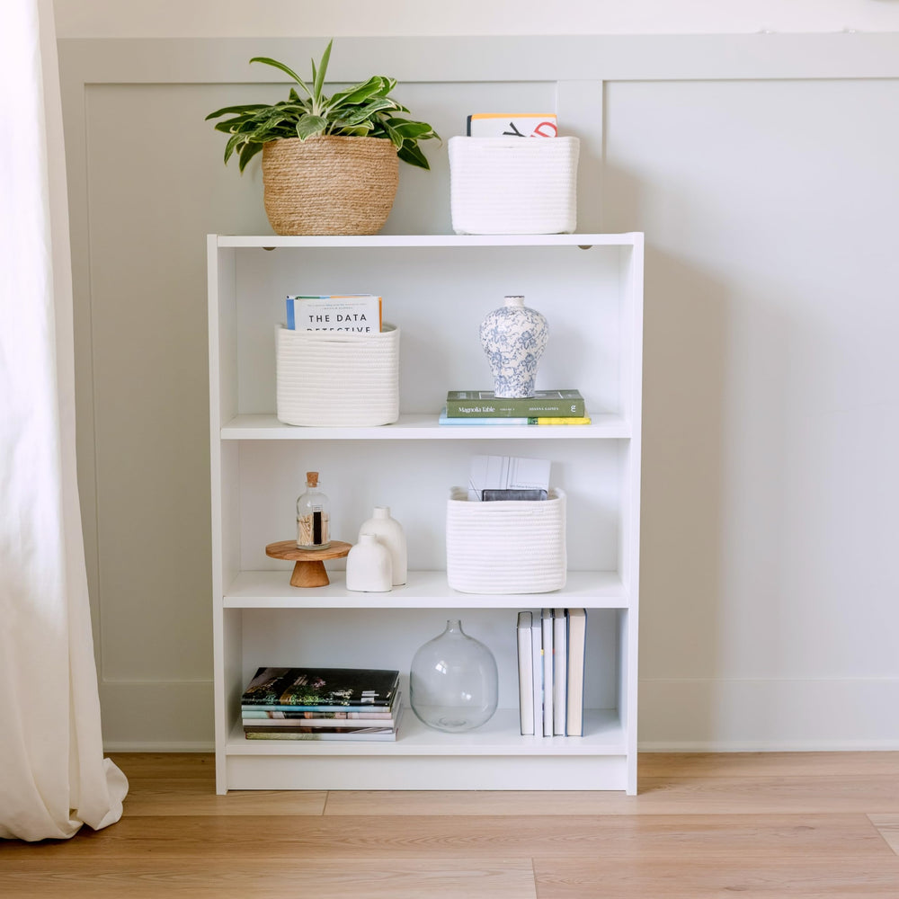 NaturalCozy next to books for scale demonstrating compact footprint and space-saving benefit