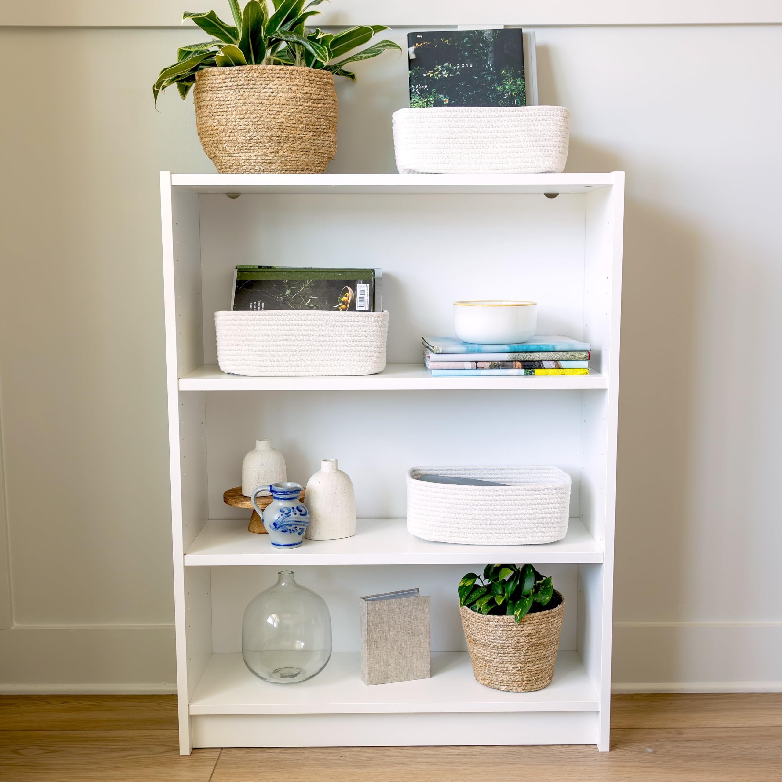 NaturalCozy two baskets stacked lightly showing space-saving vertical storage benefit
