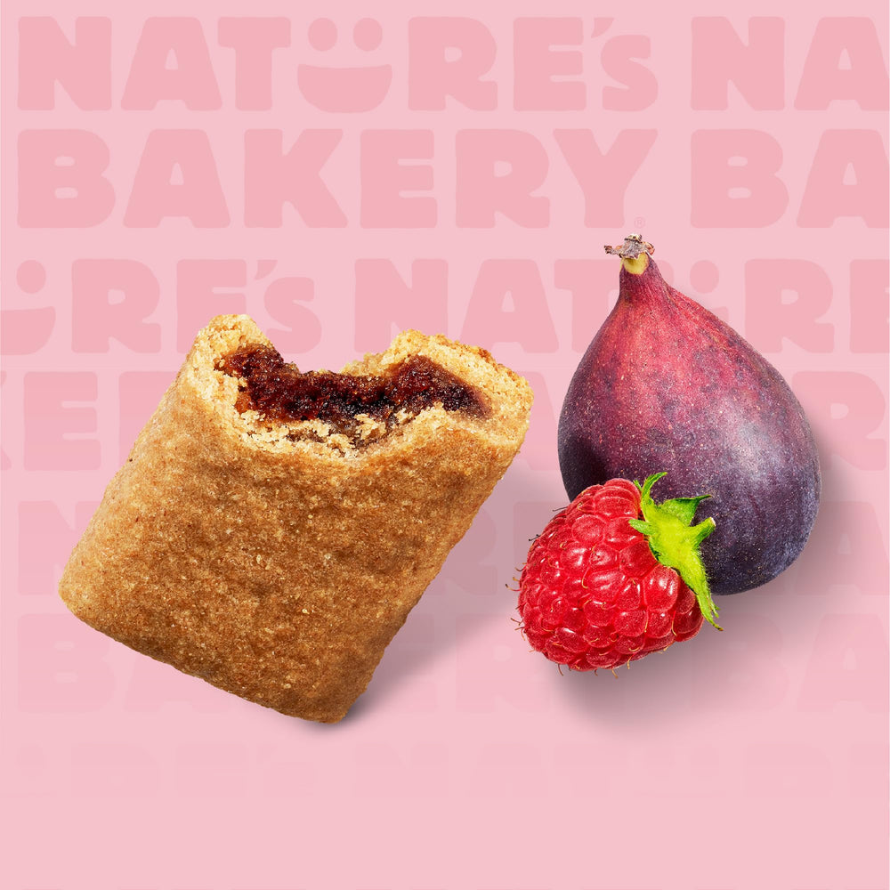 Nature's Bakery mini beside a phone for scale, pocket-friendly snack