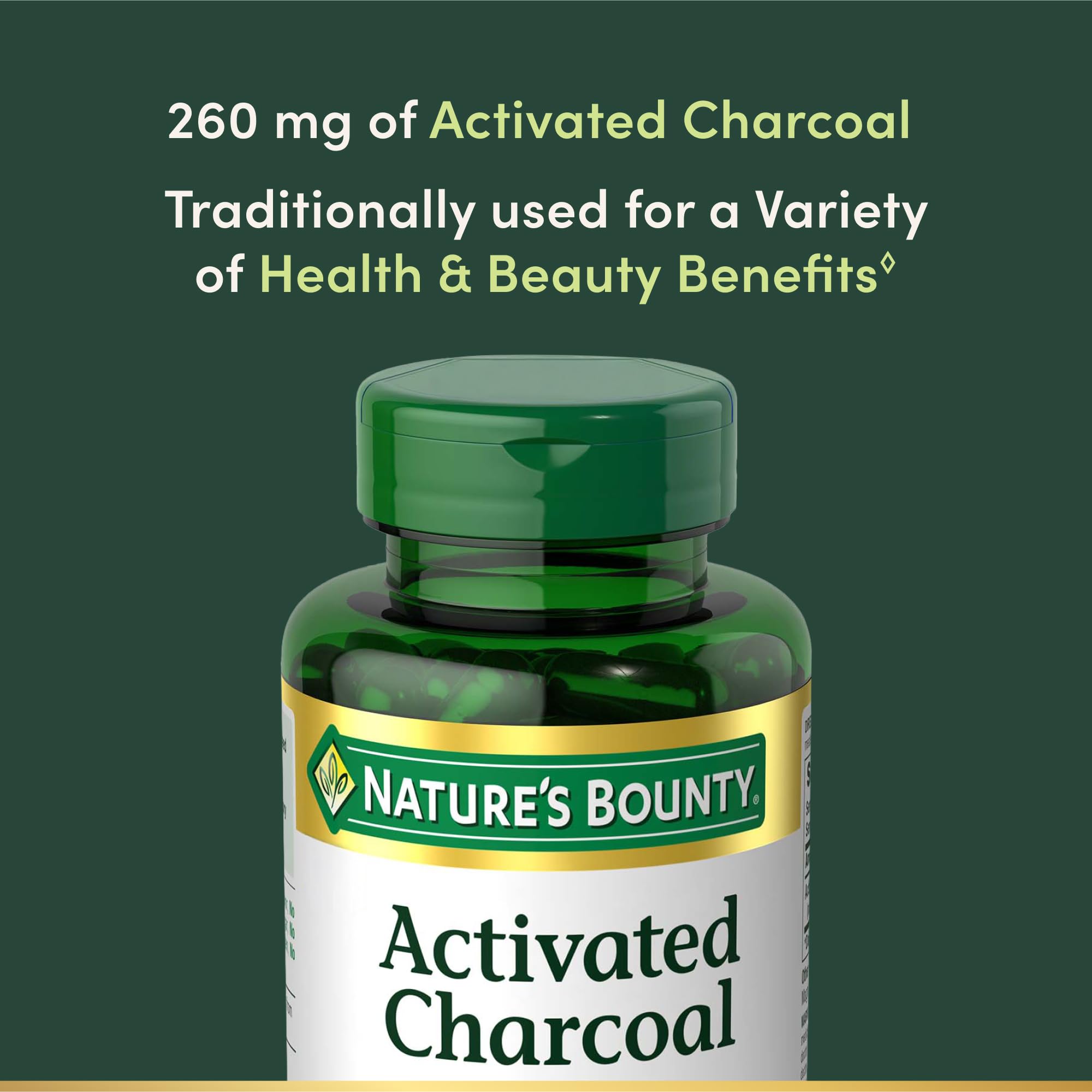 Nature's Bounty capsule beside a coin for scale, visualizing compact convenient dosing