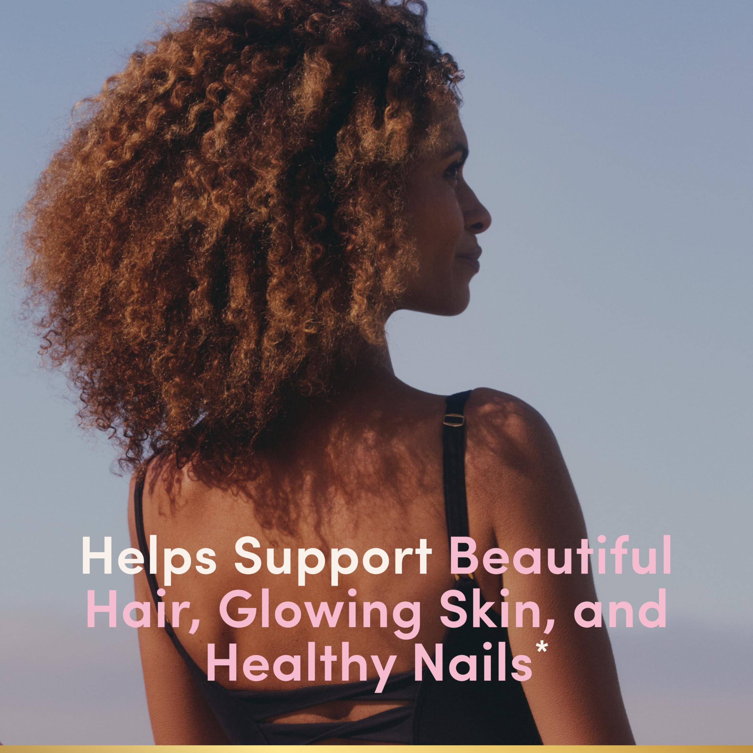 Nature's Bounty open bottle with visible strawberry gummies for easy daily use