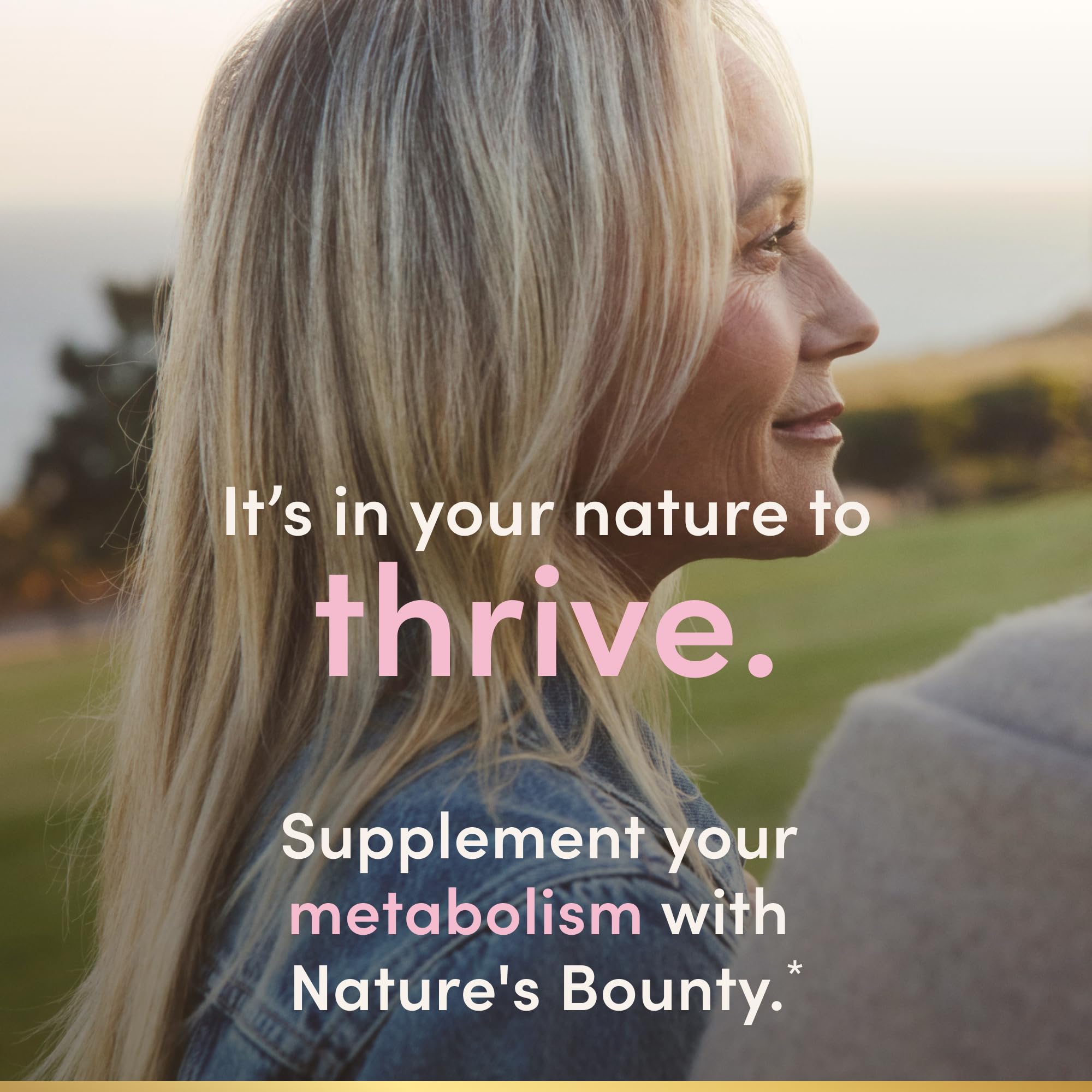 Nature's Bounty capsules in hand demonstrating serving size and travel-friendly convenience