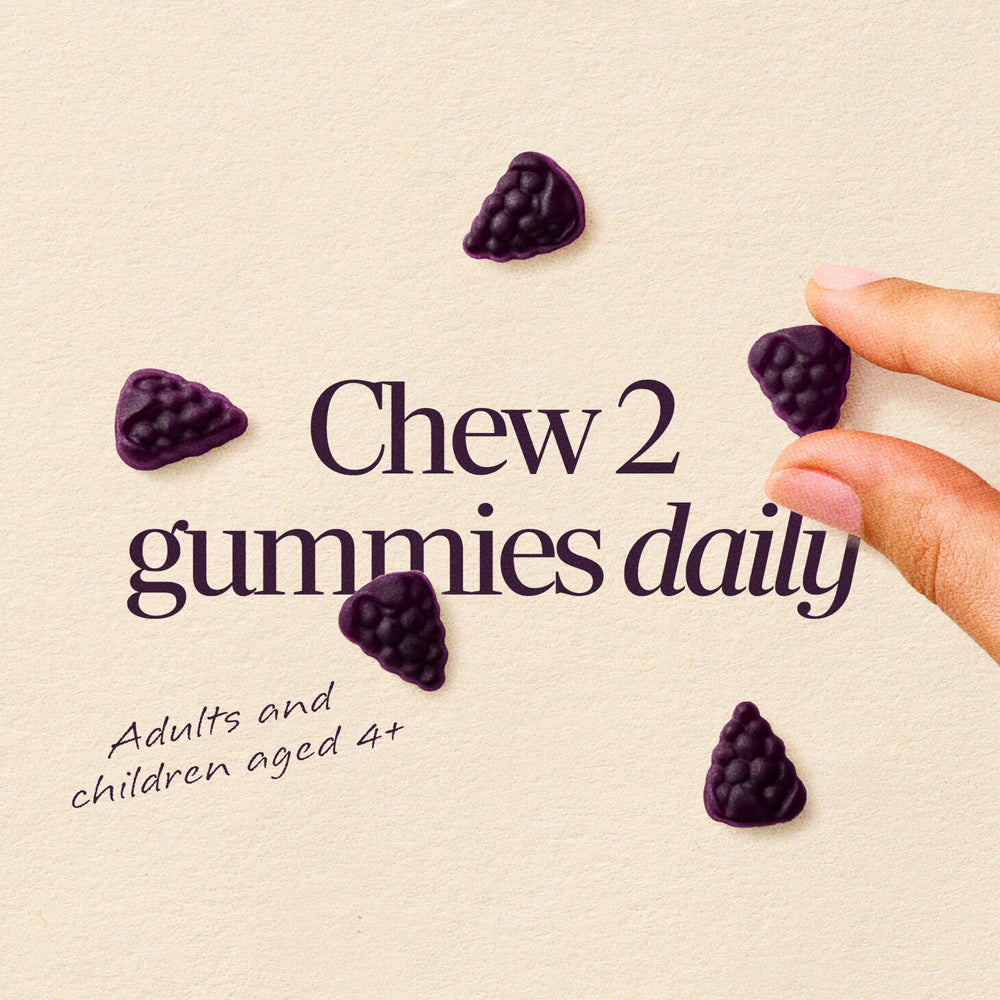 Nature's Way elderberry cluster beside gummies, visual of natural ingredient benefit