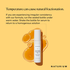 Naturium dropper dispensing serum to demonstrate easy, precise application