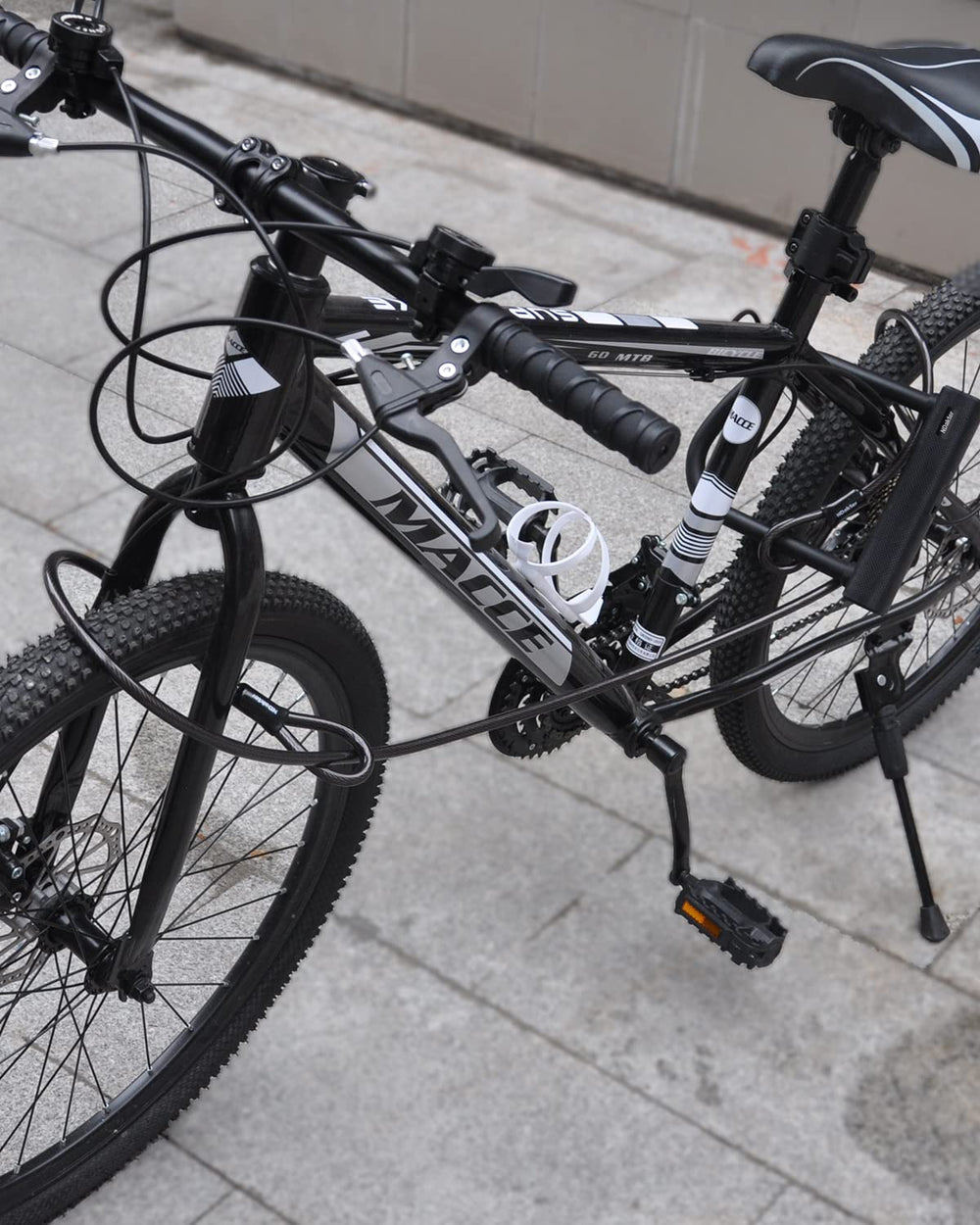 NDakter securing an e-bike outside a café for confident everyday use