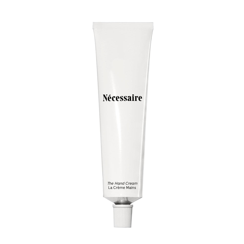 Nécessaire front packaging view showing minimalist tube and product benefits