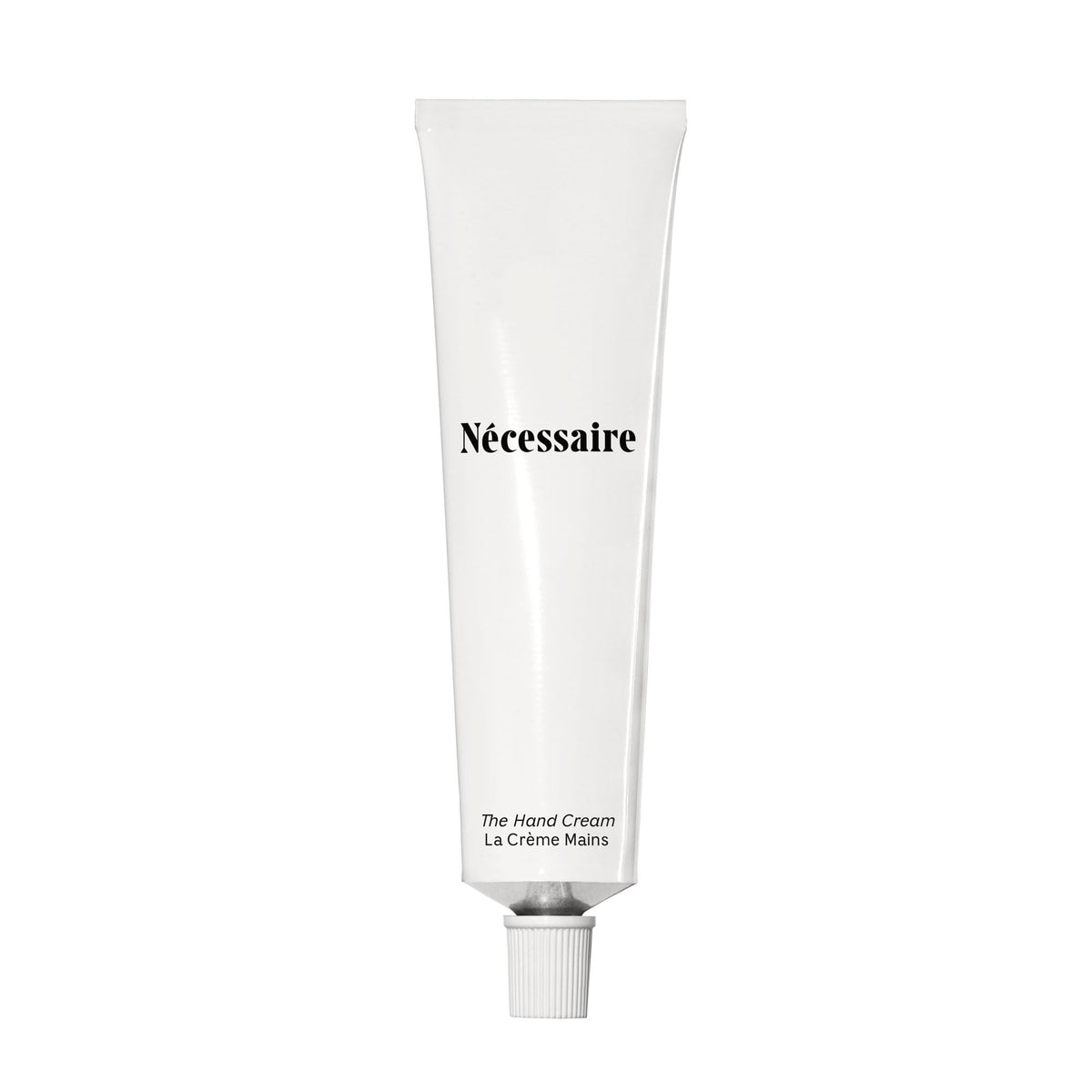 Nécessaire front packaging view showing minimalist tube and product benefits