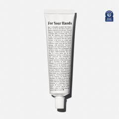 Nécessaire open tube with creamy texture demonstrating rich moisturization