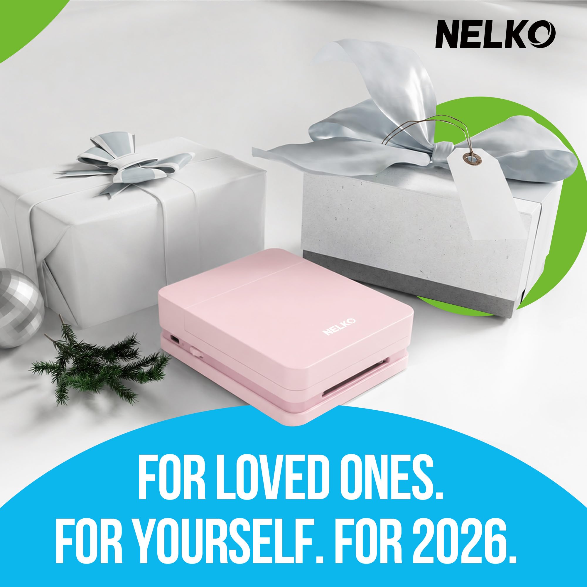 Nelko PP01 next to travel journal showing instant photos for scrapbooks