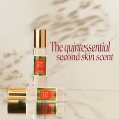 Nemat amber roll-on applicator close-up highlighting smooth stainless ball for precise application