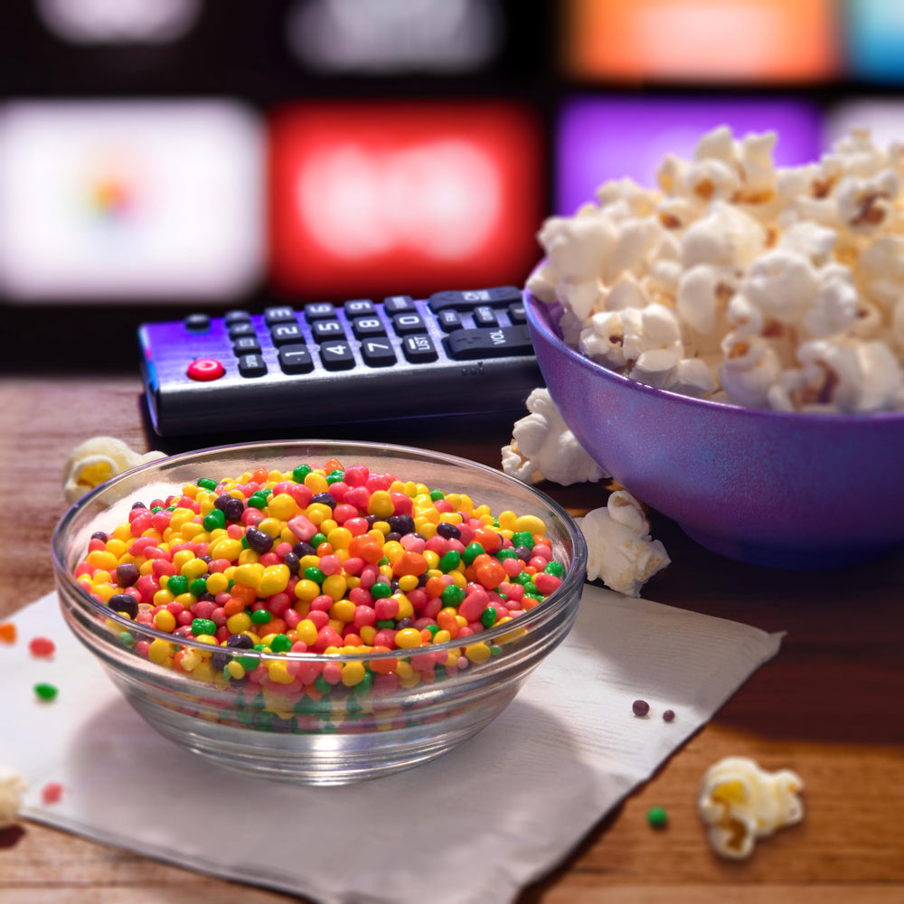 NERDS box held in hand to show size and portable, single-serve convenience