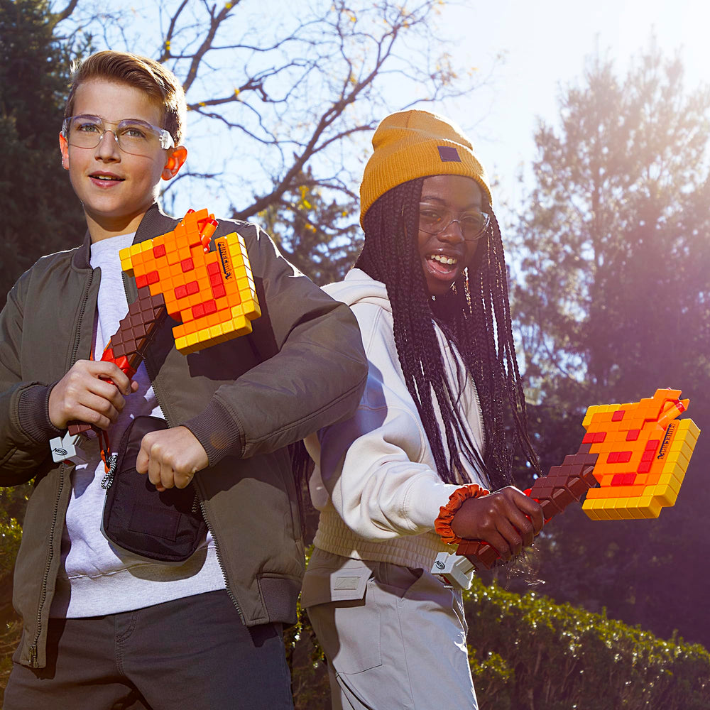 NERF Firebrand in action outdoors with player firing a dart for active yard game fun