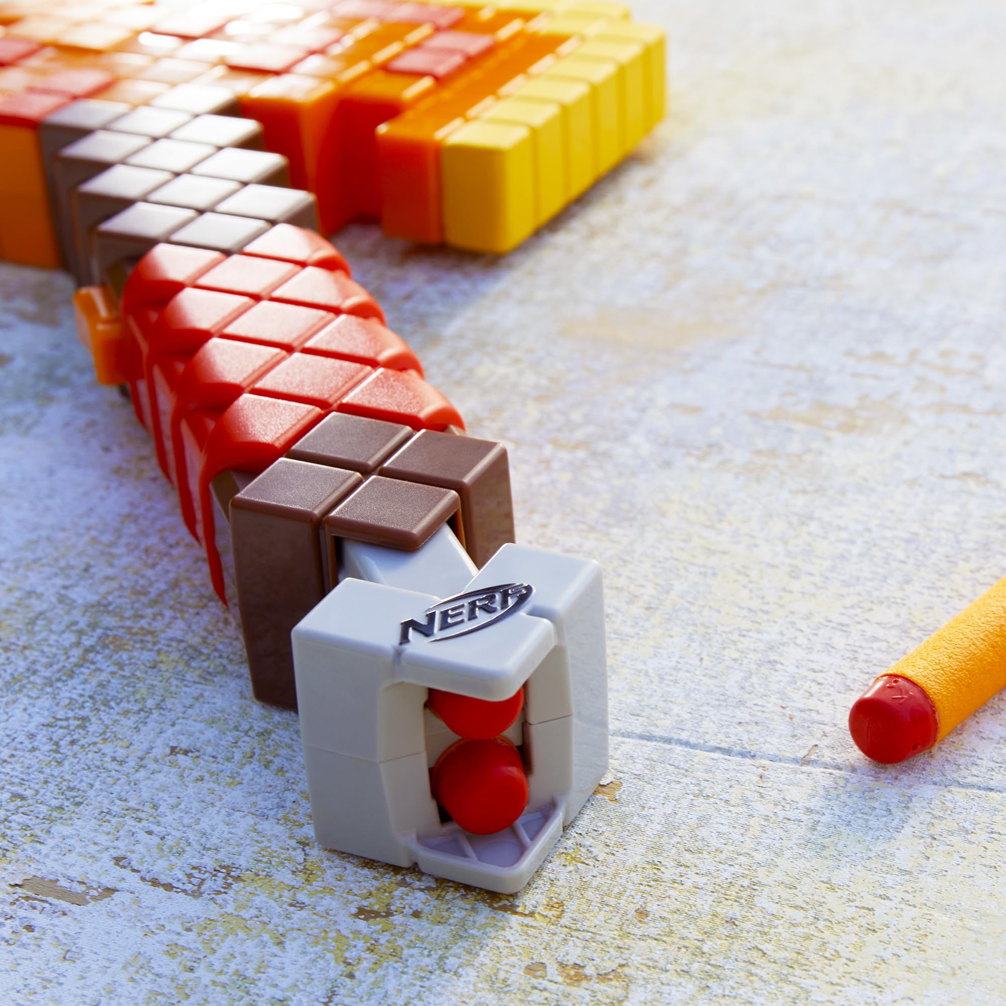 NERF Firebrand priming handle detail demonstrating easy pull-down mechanism for quick single shots