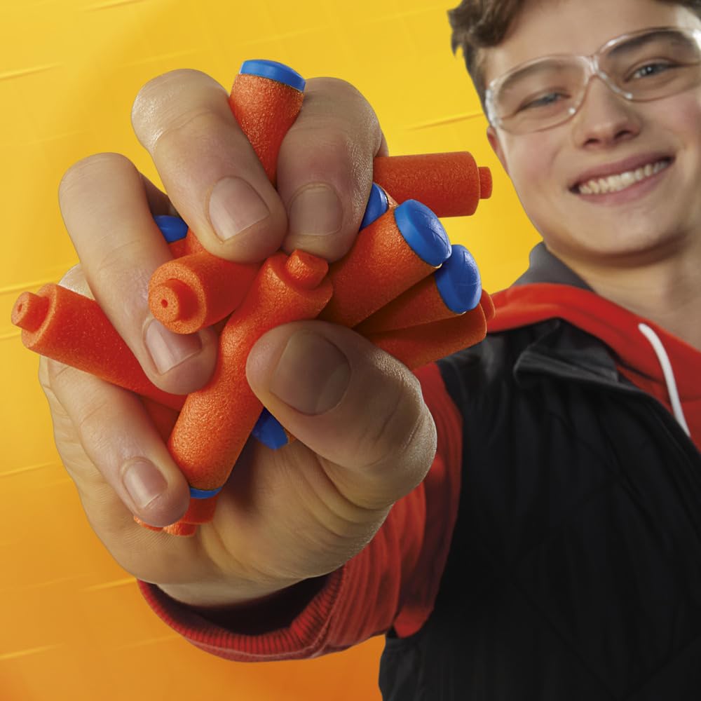 Nerf N1 darts next to a ruler showing uniform size for predictability