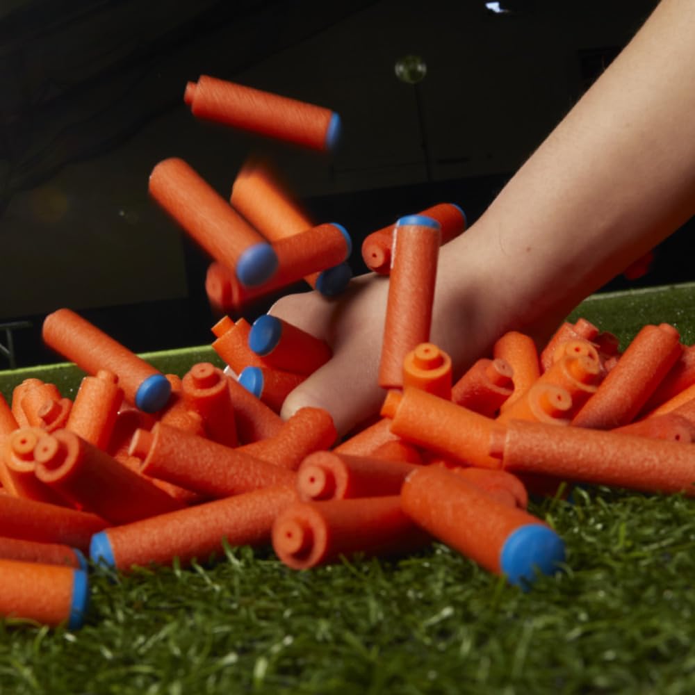 Nerf N1 darts spread on grass showing outdoor play readiness