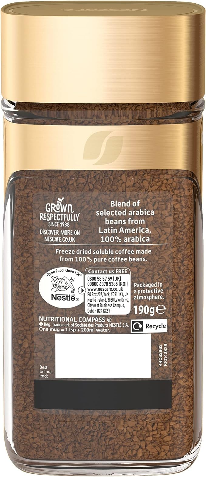 Nescafe jar open with visible instant coffee granules ready to scoop