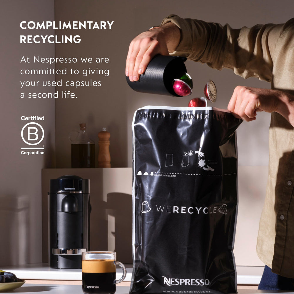Nespresso Voltesso pod next to measuring scale showing compact size