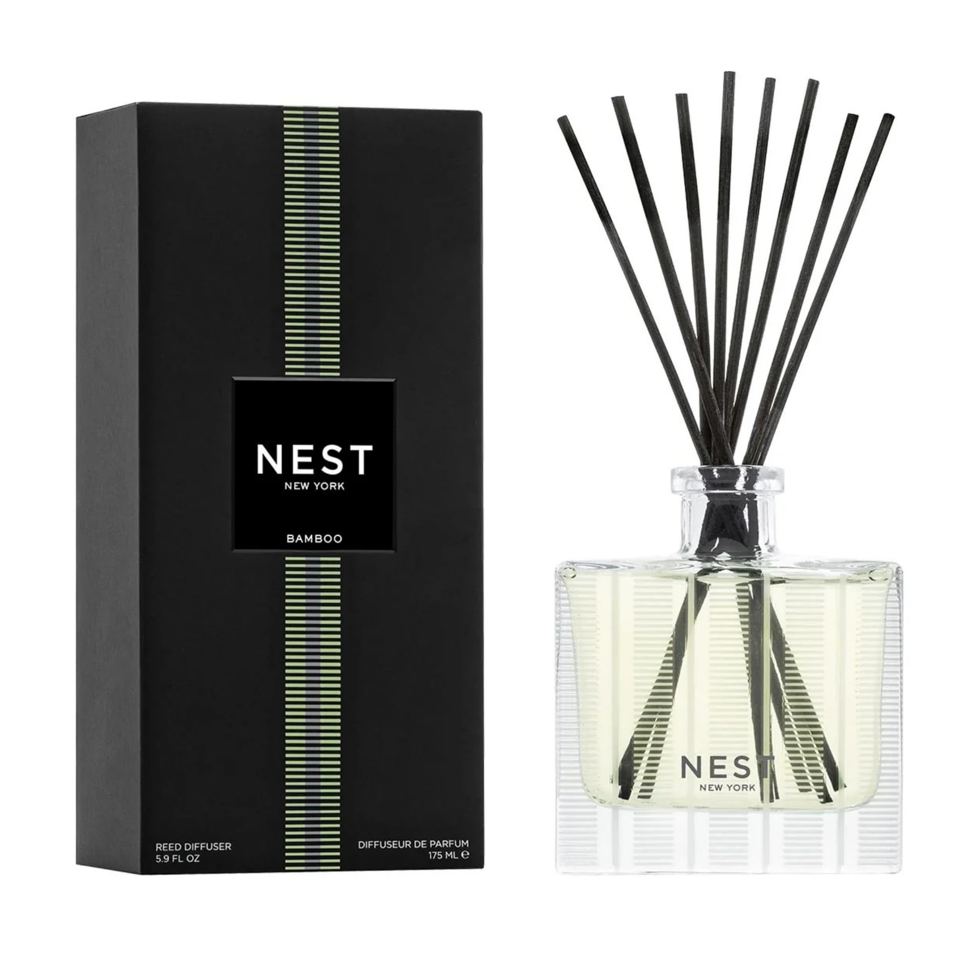 NEST New York front view of bamboo reed diffuser showing elegant glass vessel and reeds for long-lasting scent