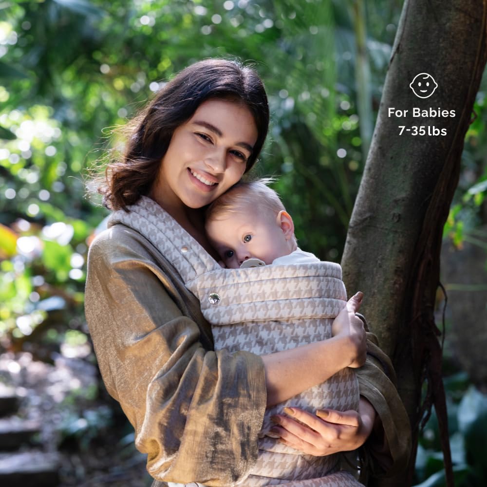 NEST BLANCHE parent walking wearing carrier demonstrating hands-free convenience