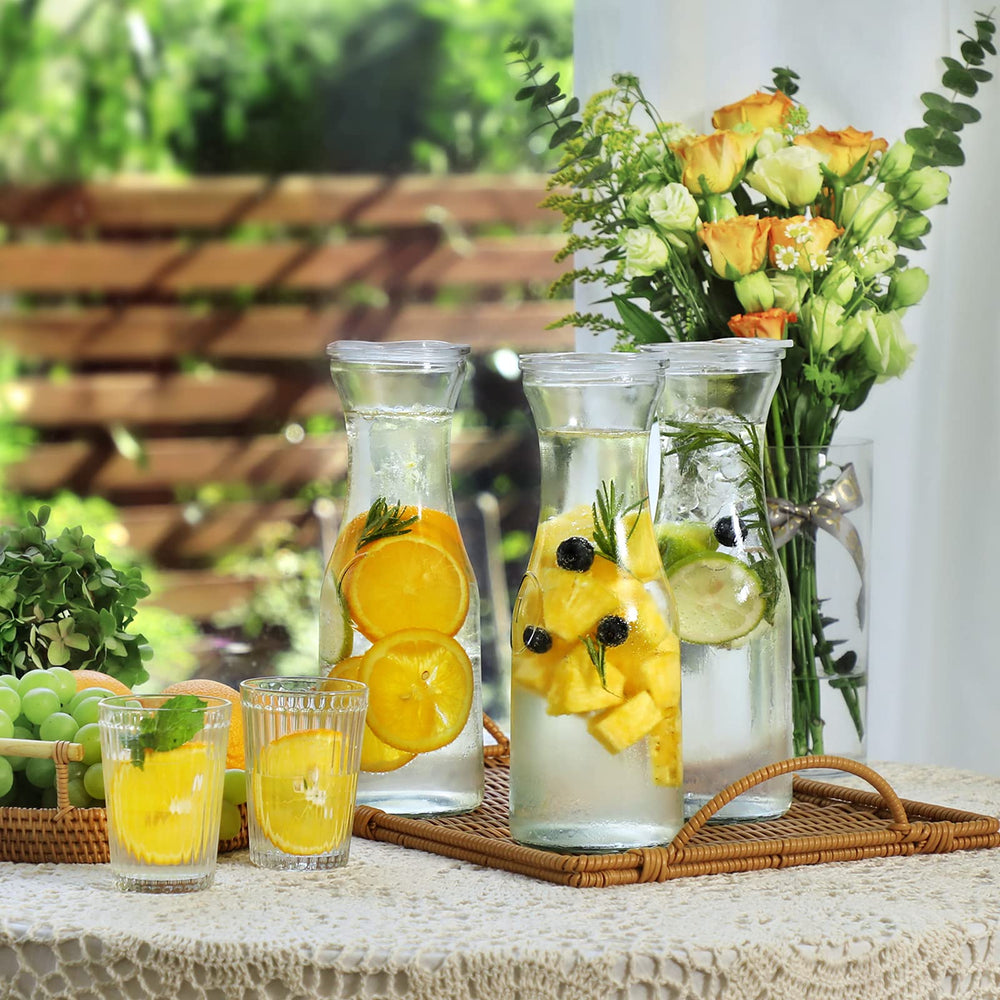 NETANY carafe next to drinking glass illustrating 1L capacity and serving scale benefit