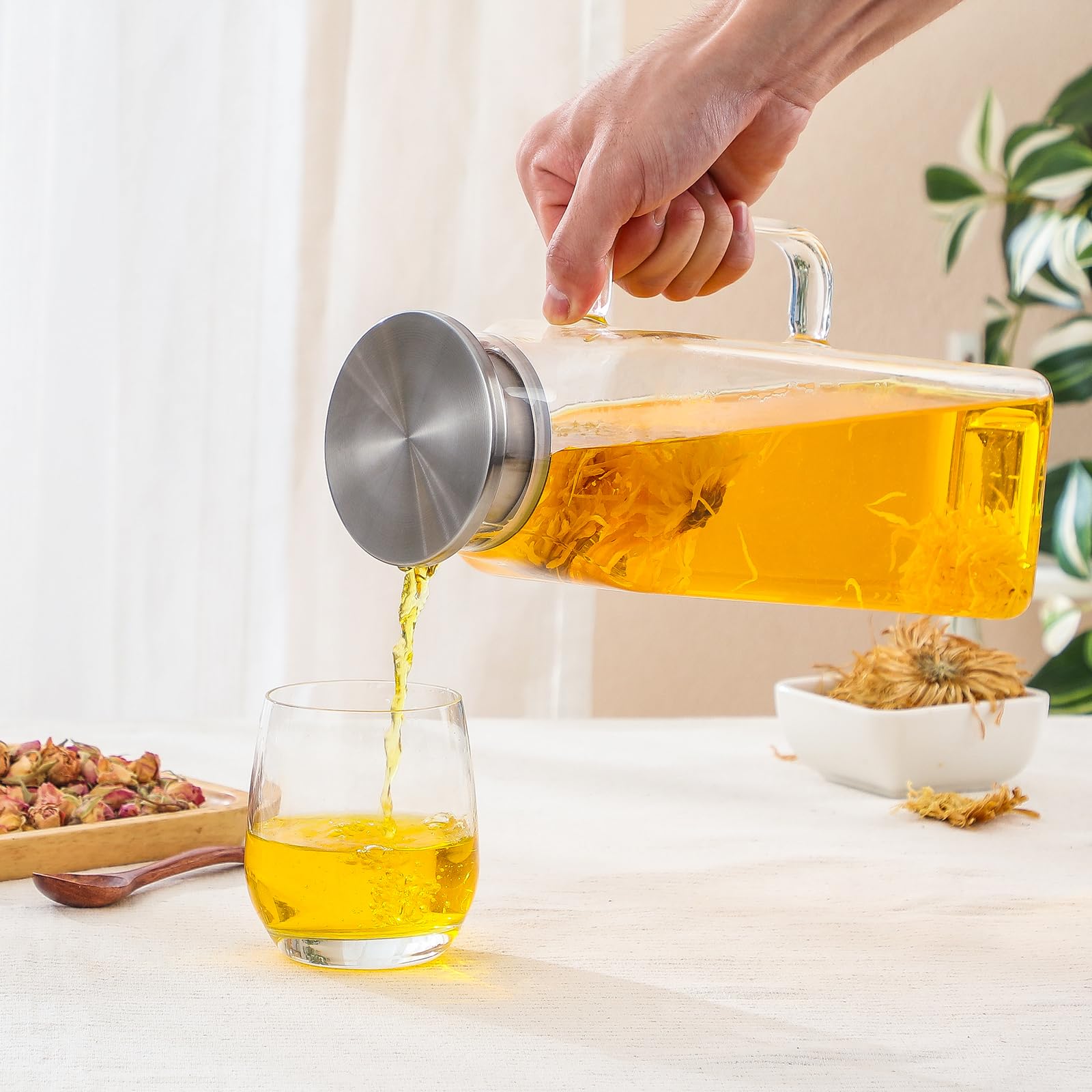 NETANY pitcher on table with drinks showcases presentation and serving convenience benefit