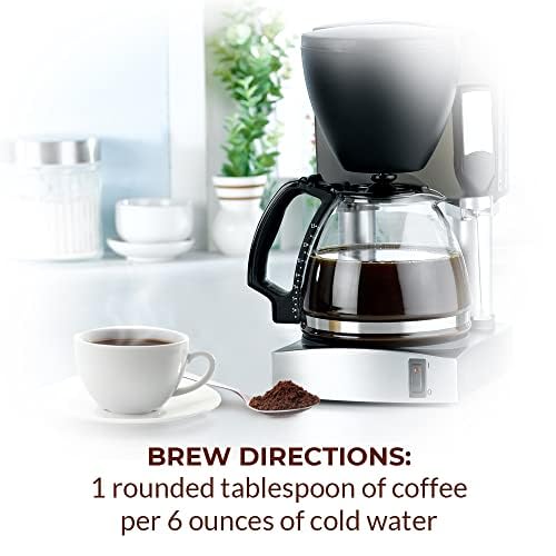 New England Coffee poured cup in hand lifestyle shot showcasing smooth vanilla flavor enjoyment