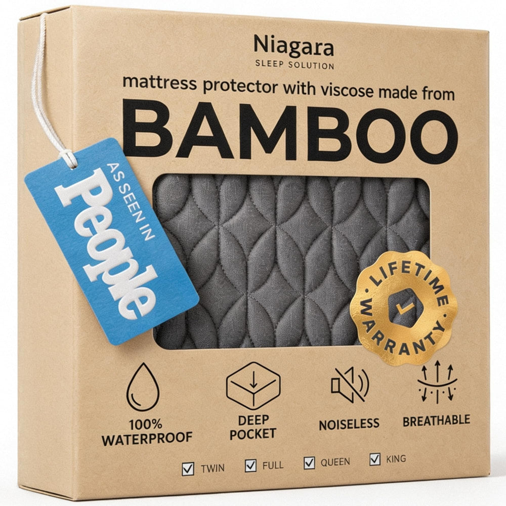 Niagara Sleep Solution twin protector front view showing gray cover and fitted corners for protection