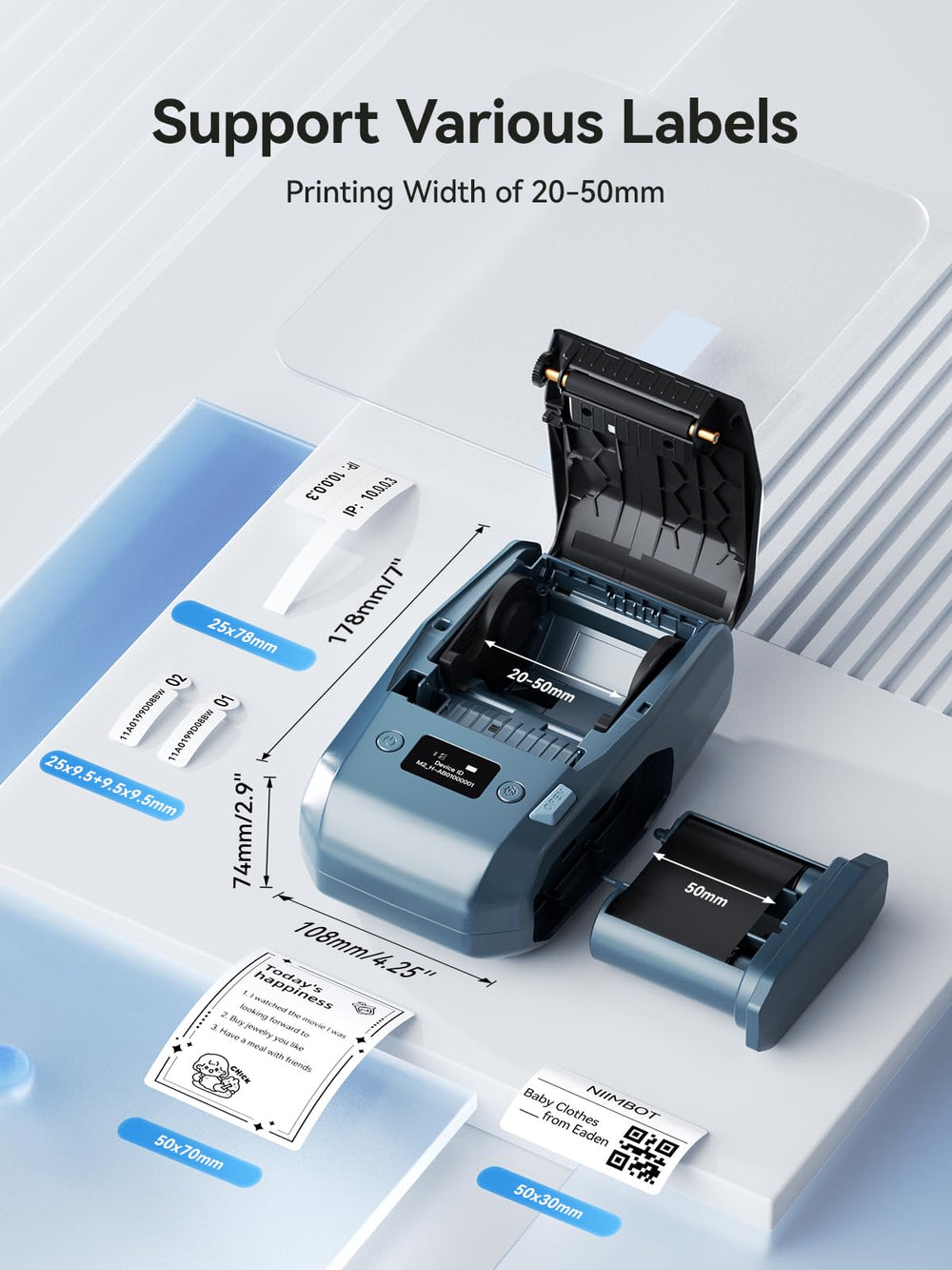 NIIMBOT M2 next to key for scale, illustrating compact portability and convenience