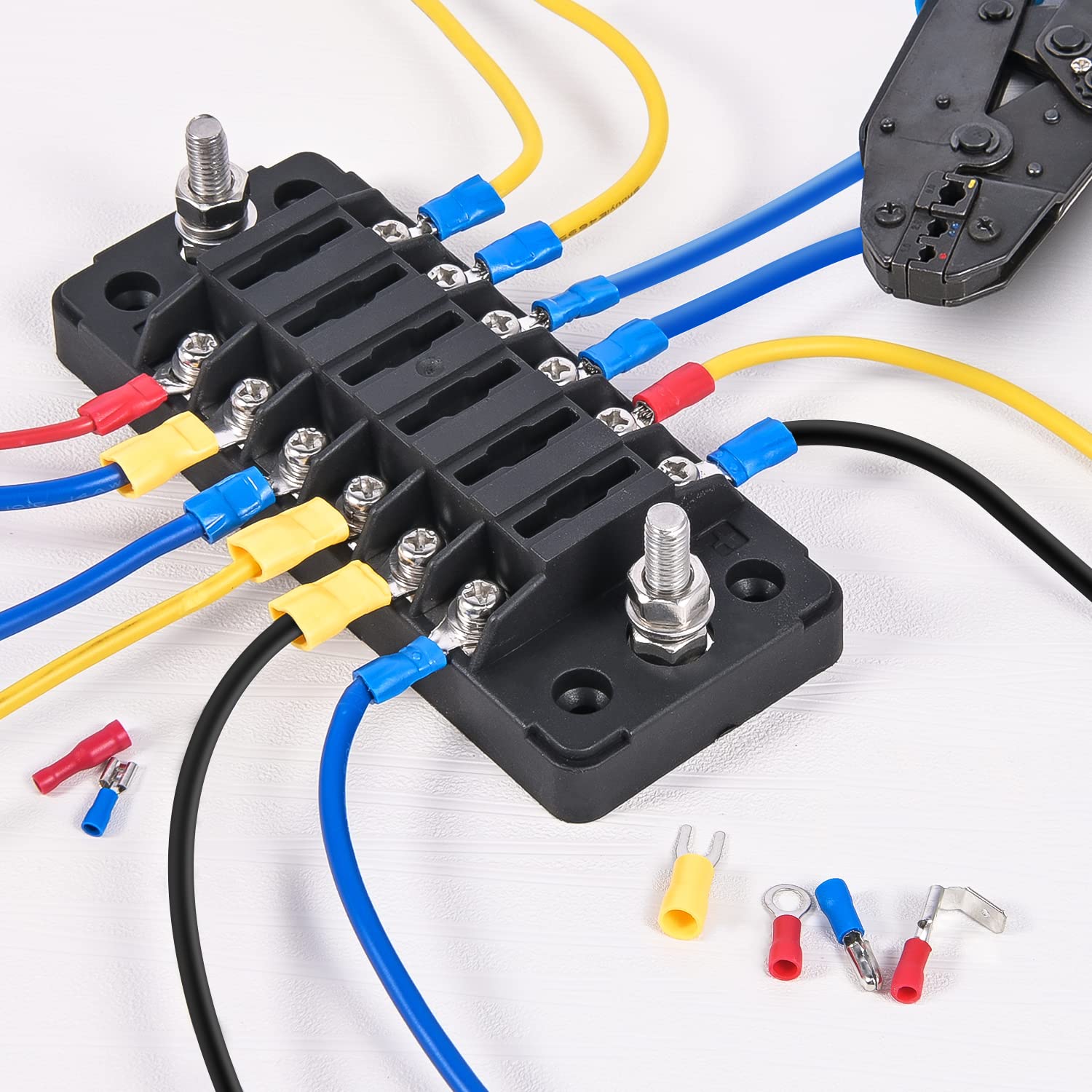 Nilight scale comparison next to a wire spool showing size compatibility across AWG ranges