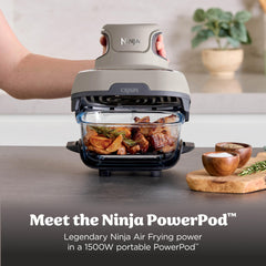 Ninja Crispi 4-qt container with roasted chicken demonstrating family-size cooking