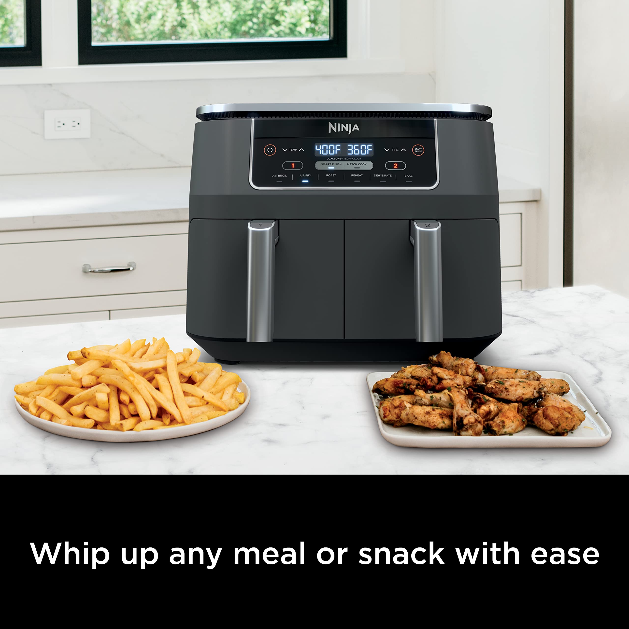 Ninja DZ201 cooking wings in one basket and fries in the other for simultaneous meals