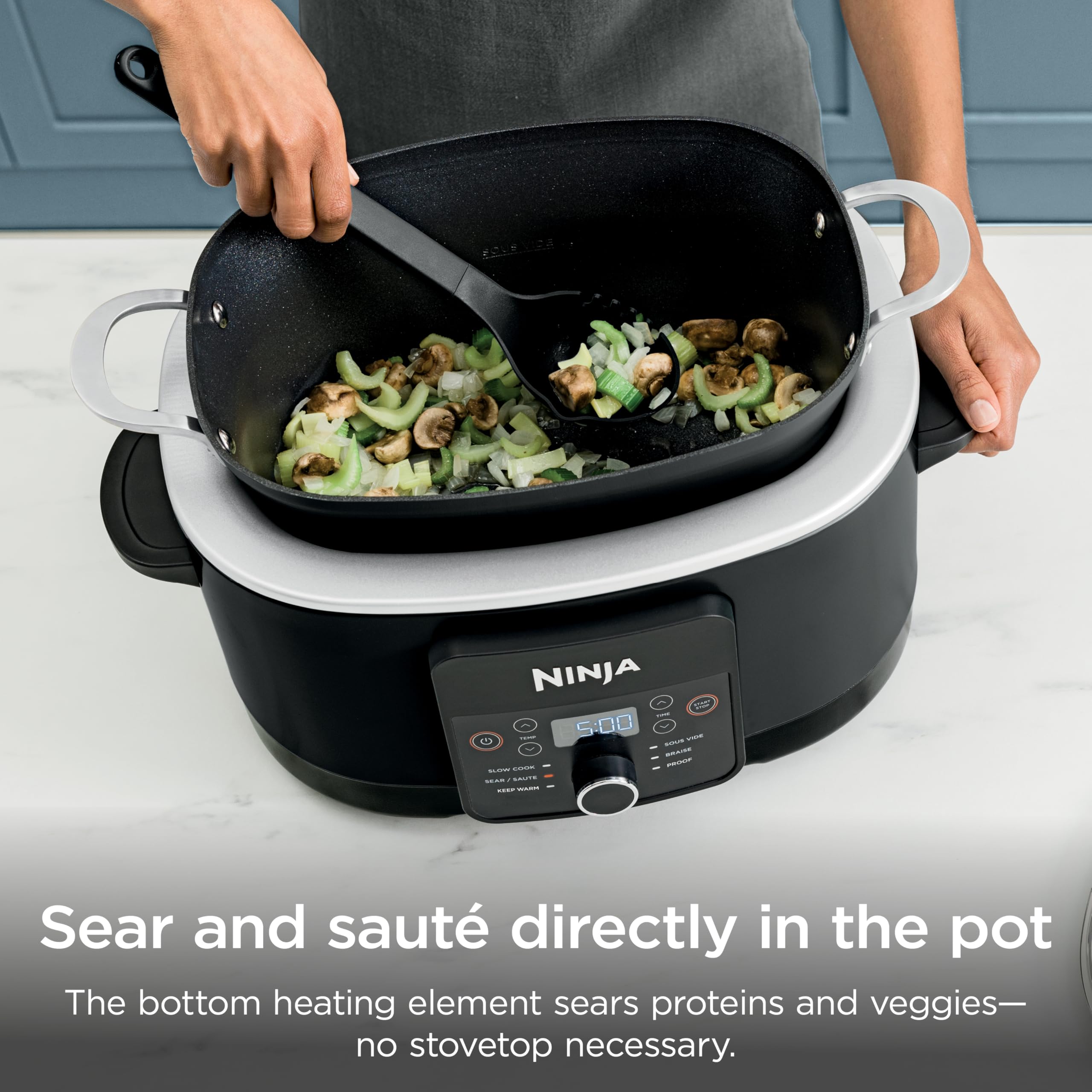 Ninja PossibleCooker PLUS full pot of chili demonstrating large 8.5‑quart capacity for entertaining