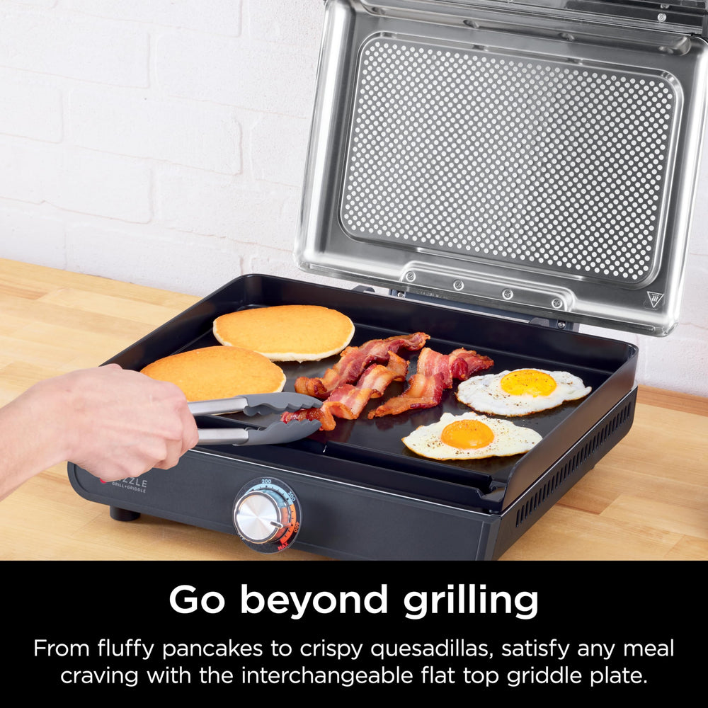 Ninja Sizzle cooking burgers on grill plate delivering high-heat sear benefits