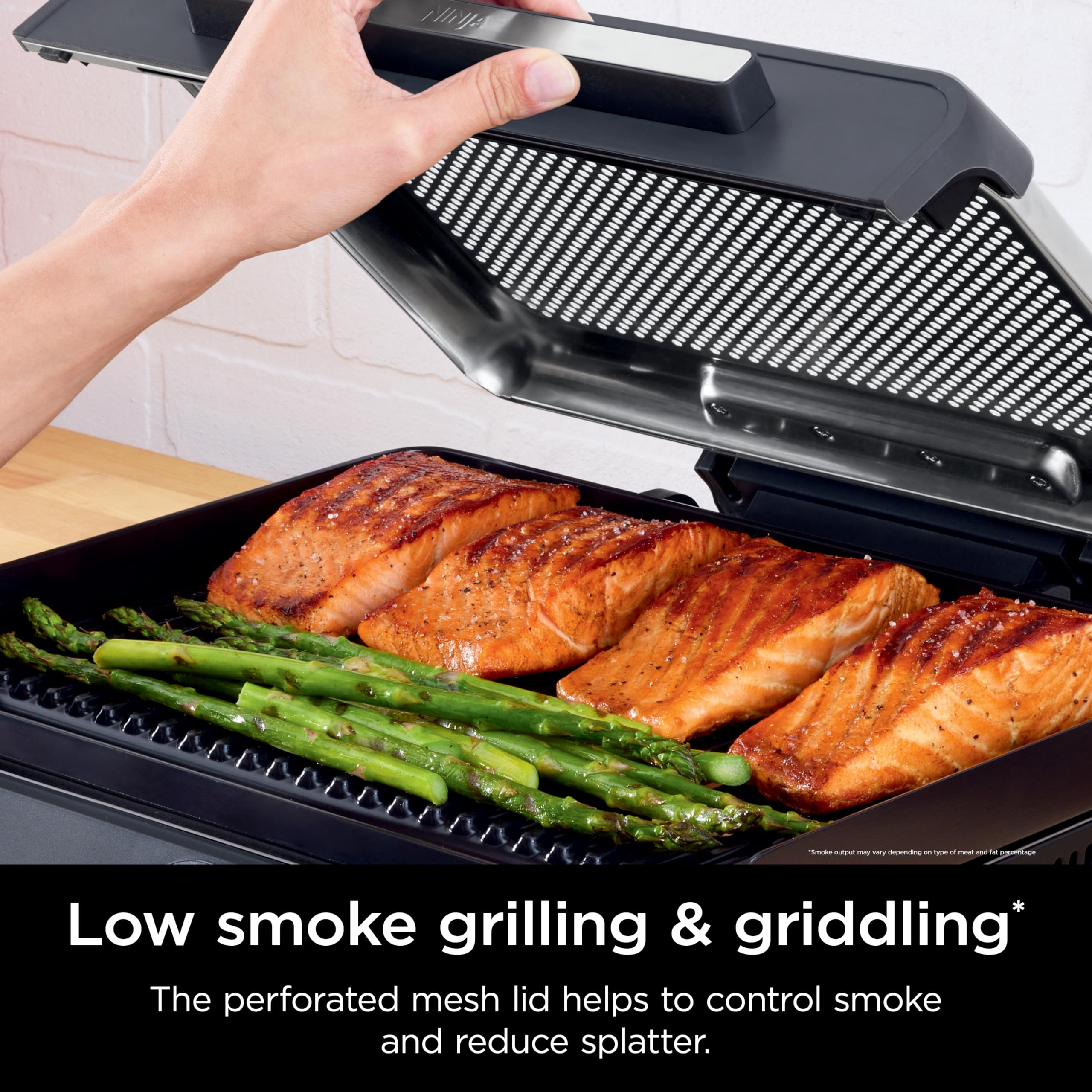 Ninja Sizzle perforated mesh lid detail reducing smoke and splatter