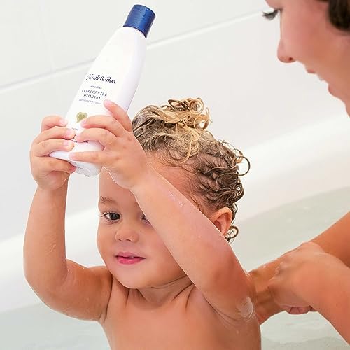 Noodle & Boo bottle beside a toy illustrating 16 fl oz size and family-friendly value