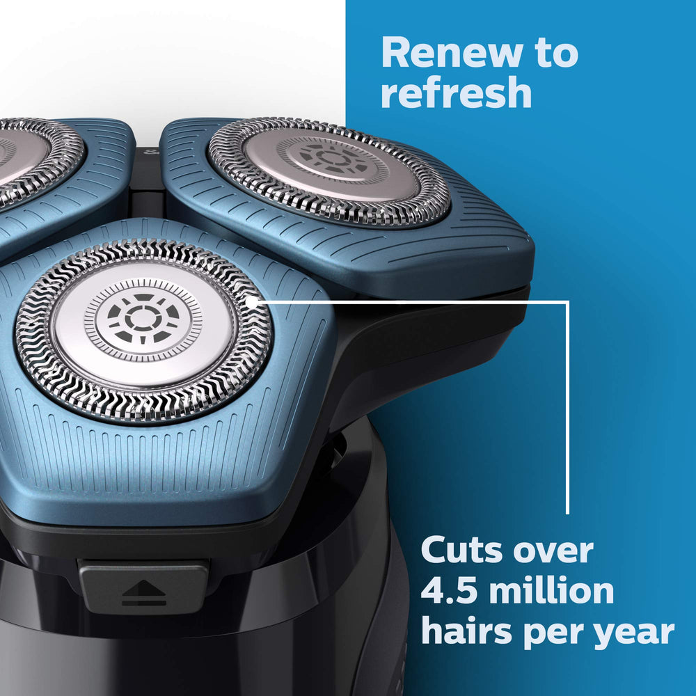 Norelco SH71 held in hand to show size and scale for easy installation benefit