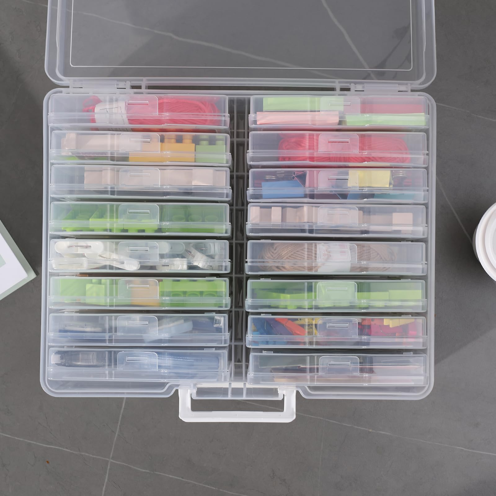 novelinks stacked inner cases open showing modular organization benefit