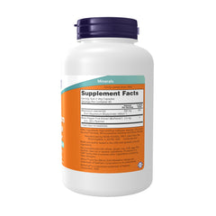 NOW magnesium glycinate capsules close-up highlighting smooth vegetarian capsules