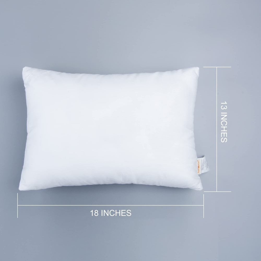 NTBAY pillow beside ruler demonstrating accurate 13 x 18 inch size