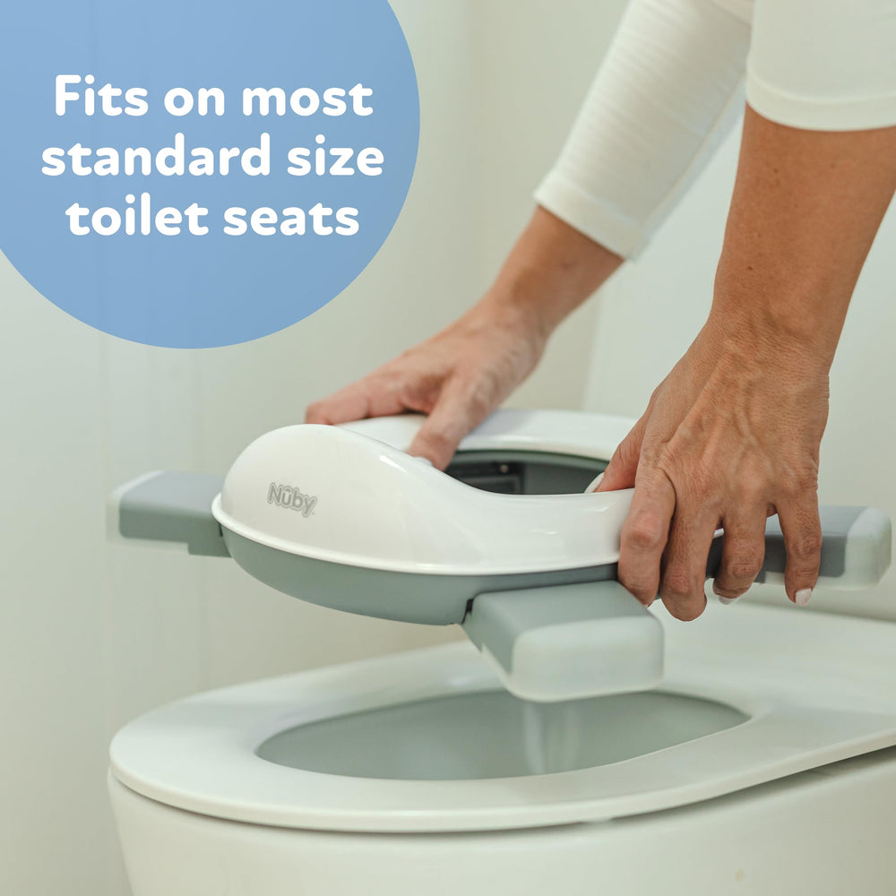 Nuby potty in outdoor family setting enabling stress-free potty breaks on trips