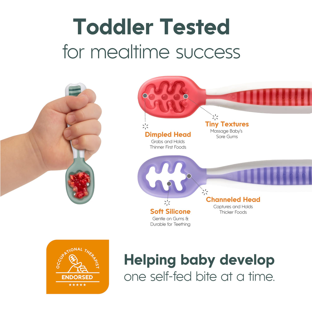 Baby using NumNum spoon independently to build feeding confidence