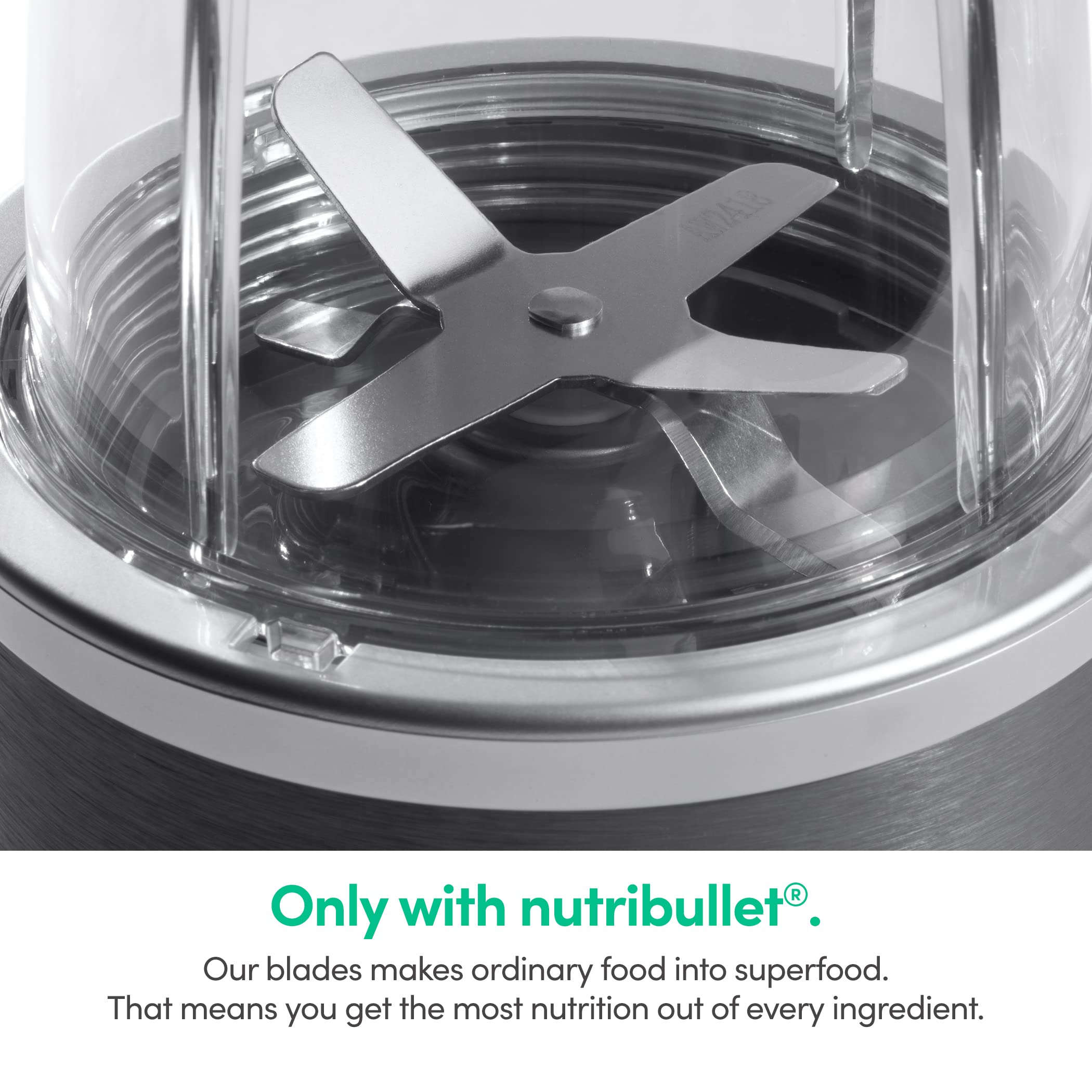 NutriBullet components laid out with motor, cup, blade, lid for easy setup