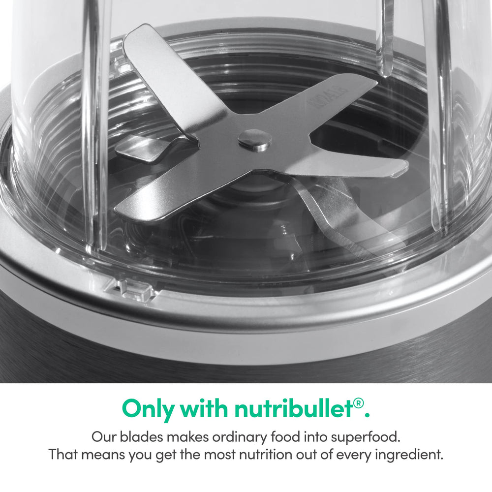 NutriBullet components laid out with motor, cup, blade, lid for easy setup