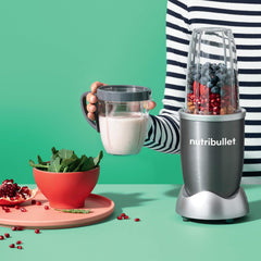 NutriBullet to-go lid and lip ring shown for spill-resistant travel convenience