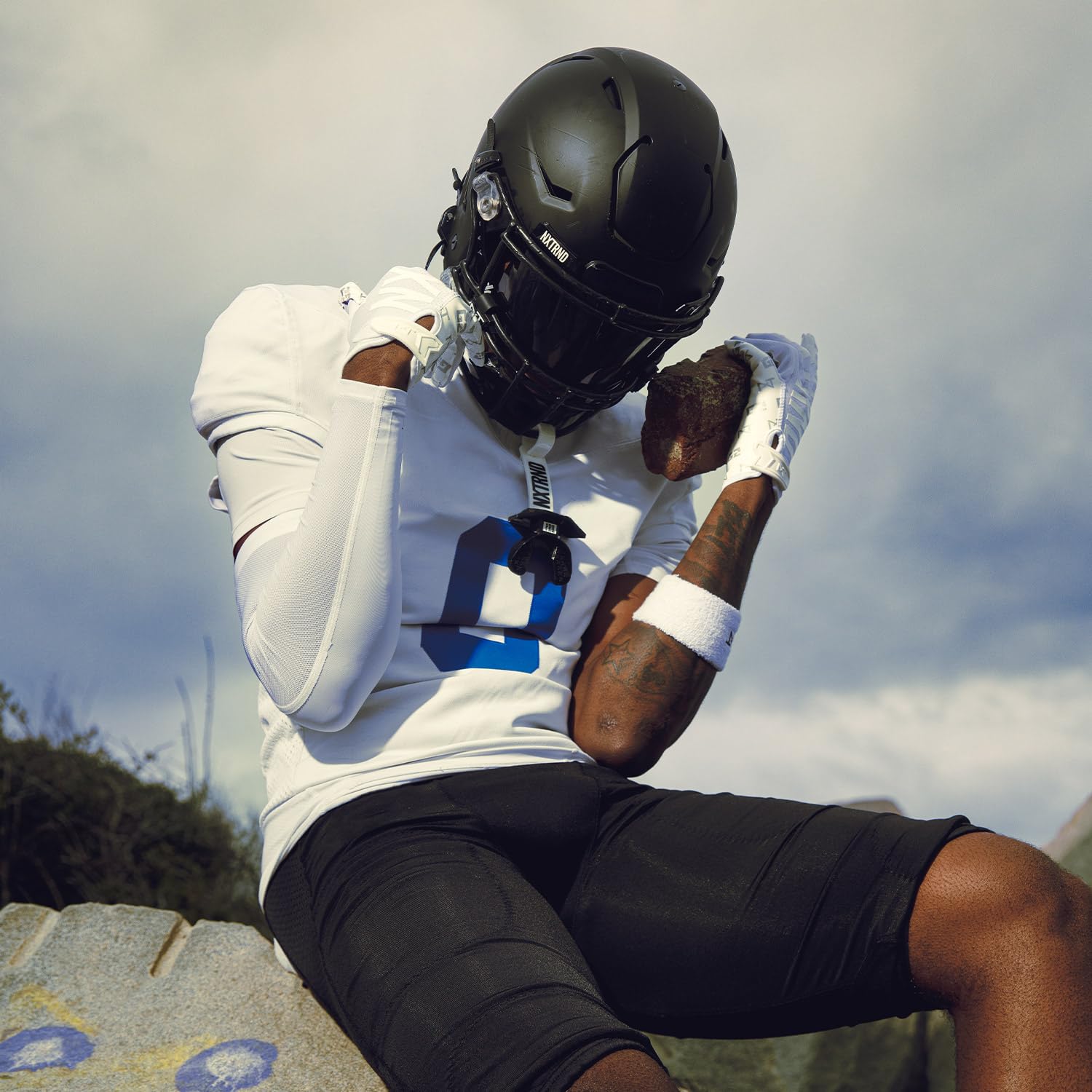 Nxtrnd lifestyle field shot showing player wearing guard for confidence benefit