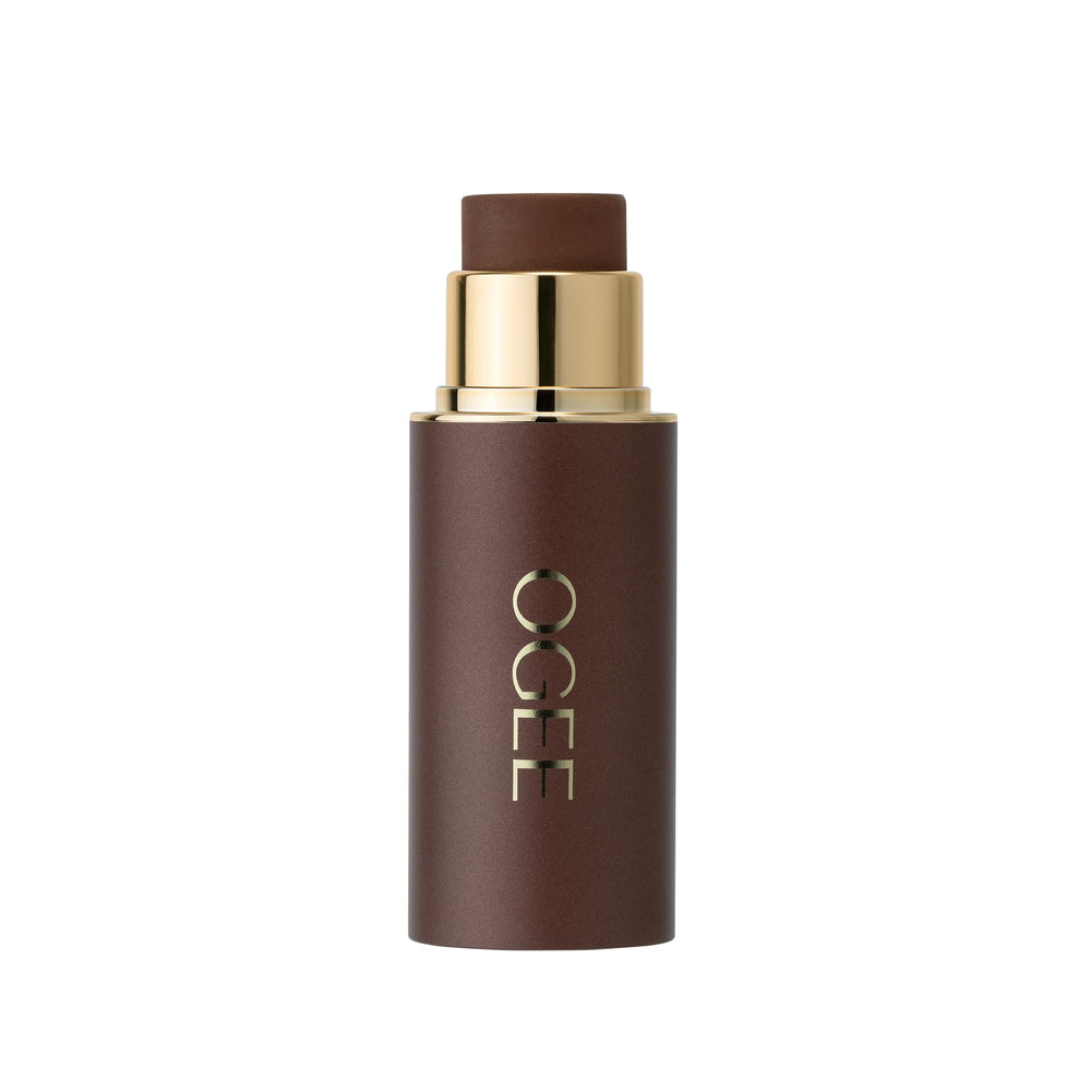Ogee face stick front view showing copper shade and compact design for travel