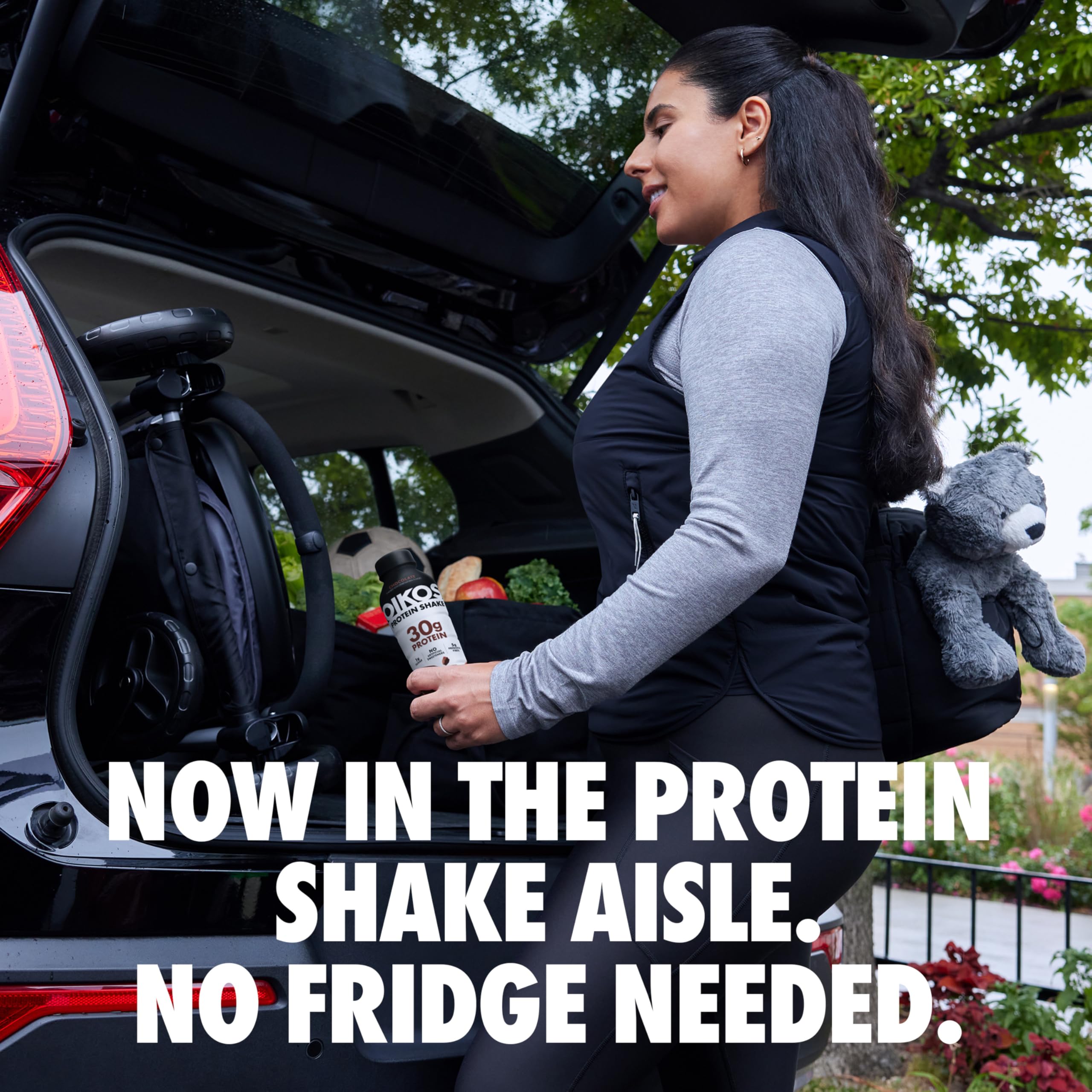 Oikos bottle tucked inside a gym bag for convenient post-workout
