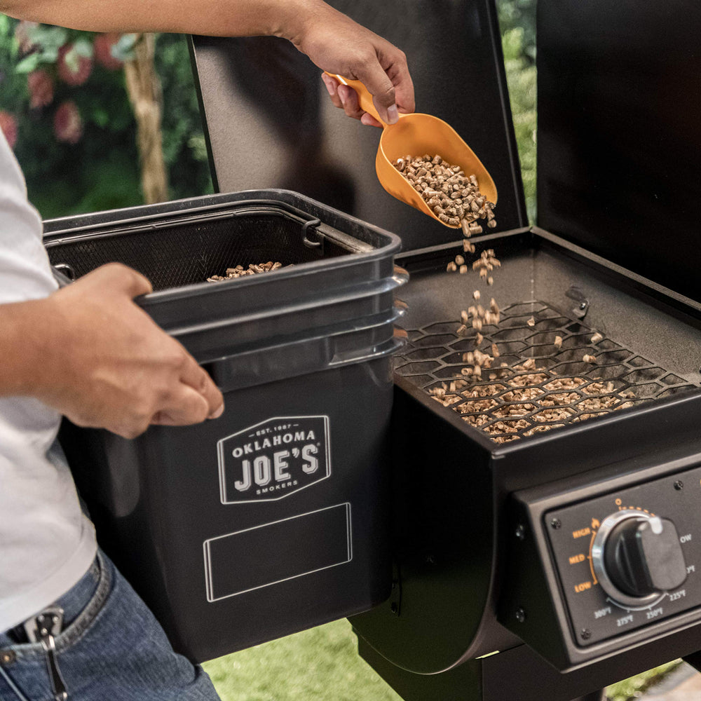 Oklahoma Joe's pellet bucket lid seal detail keeping pellets dry and protected